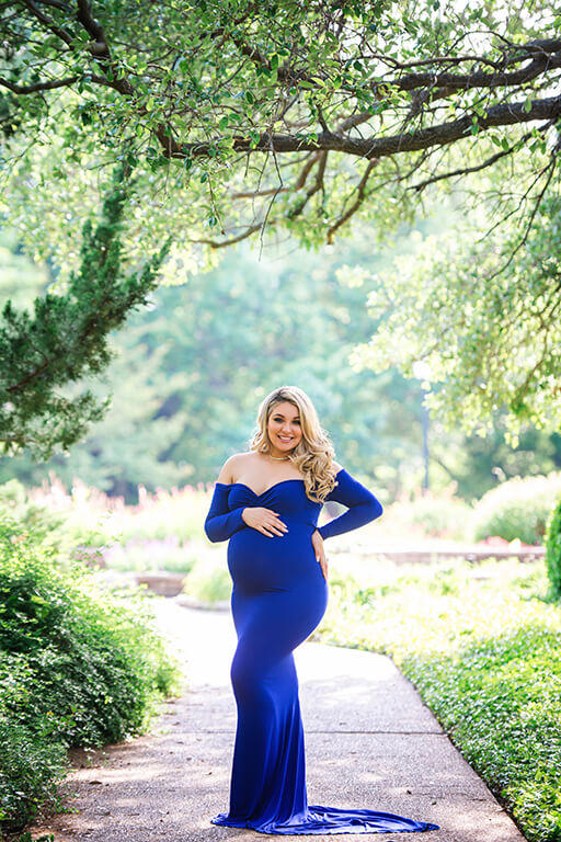Maternity session outdoor with blue maternity gown