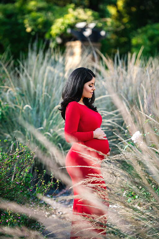 red dress outdoor maternity photography