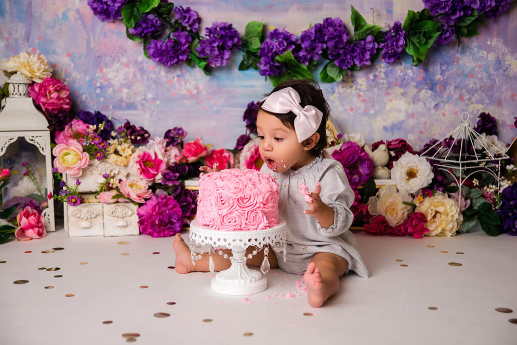 Purple floral baby girl cake smash