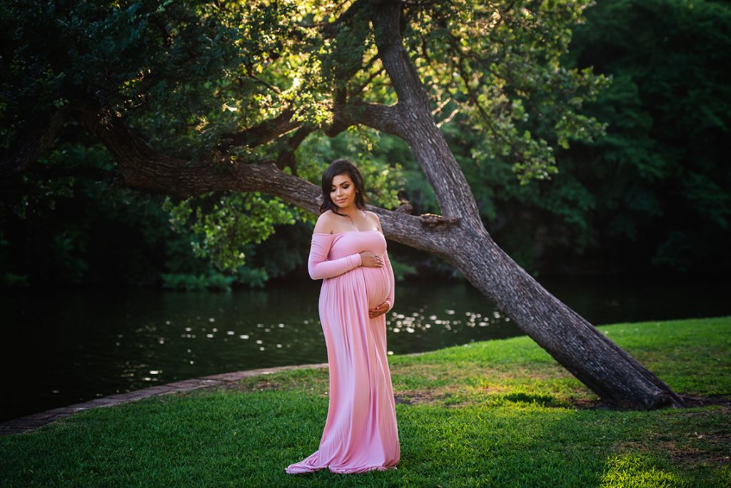 Pink maternity photography gown for outdoor photoshoot