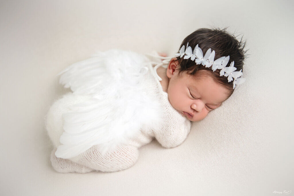 our little angel newborn photo session girl